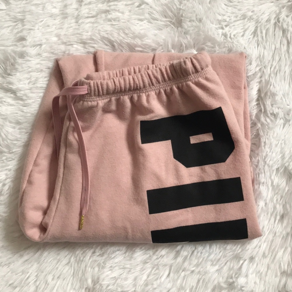 PINK SWEATS WITH ZIPPERS